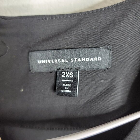 UNIVERSAL STANDARD Jenna Stretch Poplin Flounce Dress Size 2XS Black Classic - Picture 4 of 8